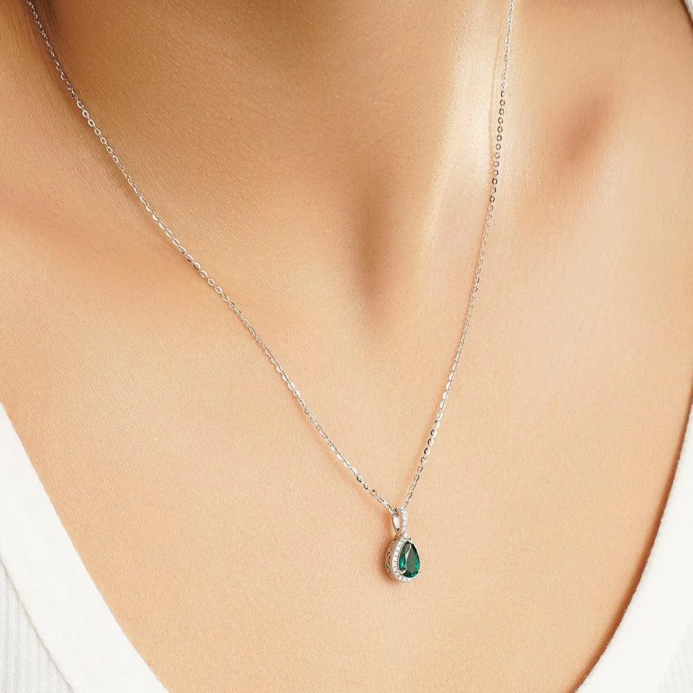 1 CT. Pear Shaped Emerald Pendant with Pavé Diamond Halo