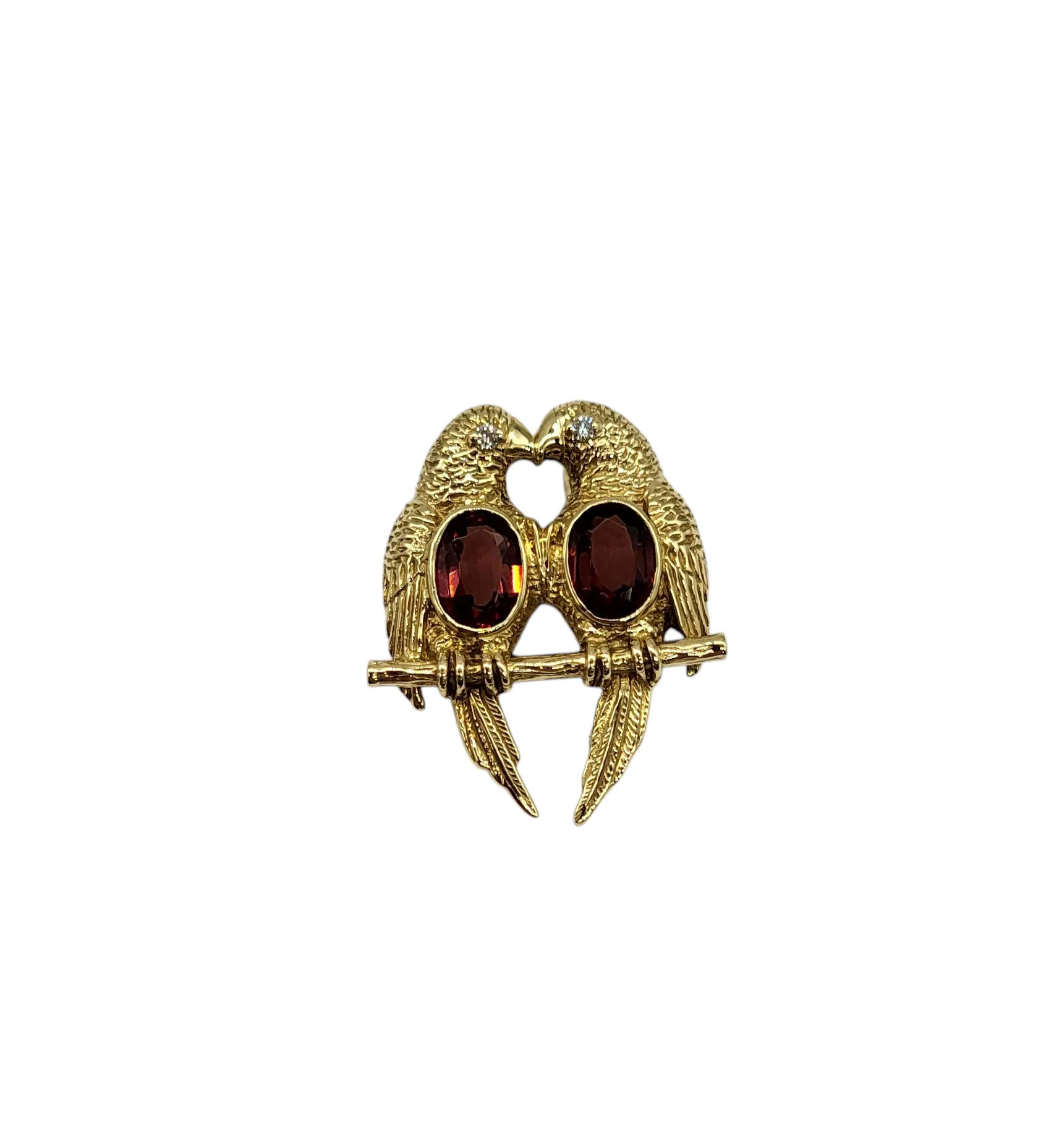 14 Karat Gold Parrot Pendant with Garnet Gemstones