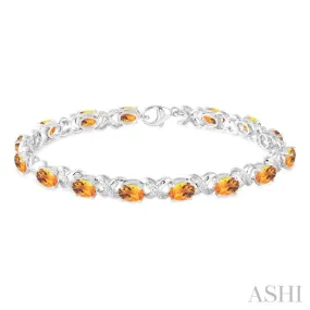 7x5 mm Oval Cut Citrine and 1/20 Ctw Round Cut Diamond Fashion Bracelet in Sterling Silver